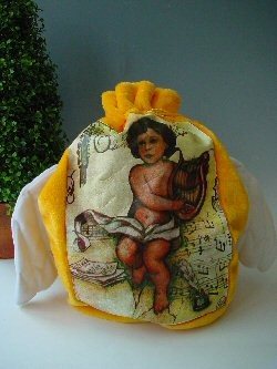 Väike kunstkarusnahast kingikott inglitiibadega (2 tk)